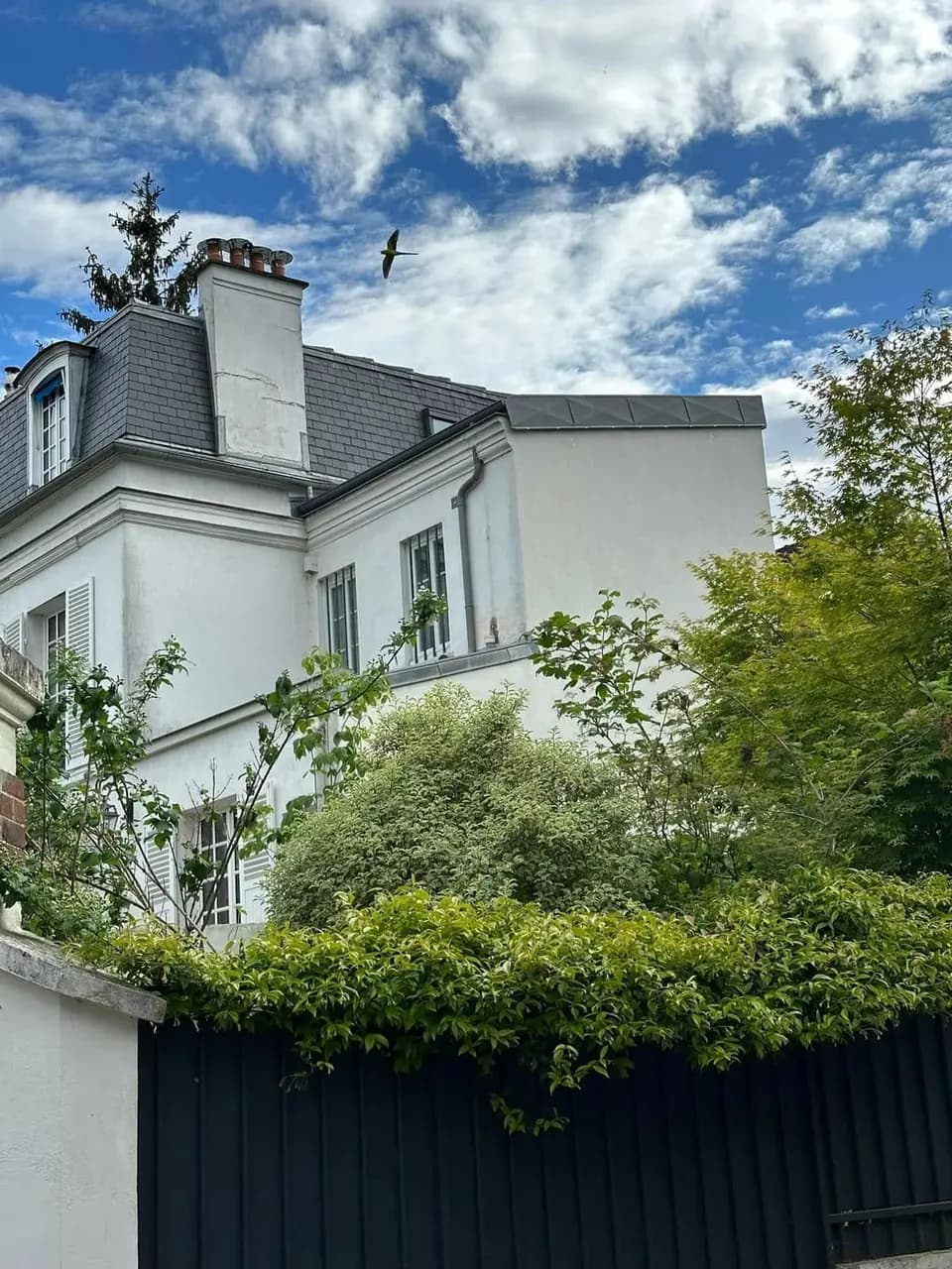 Toiture zinc et ardoise sur maison bourgeoise